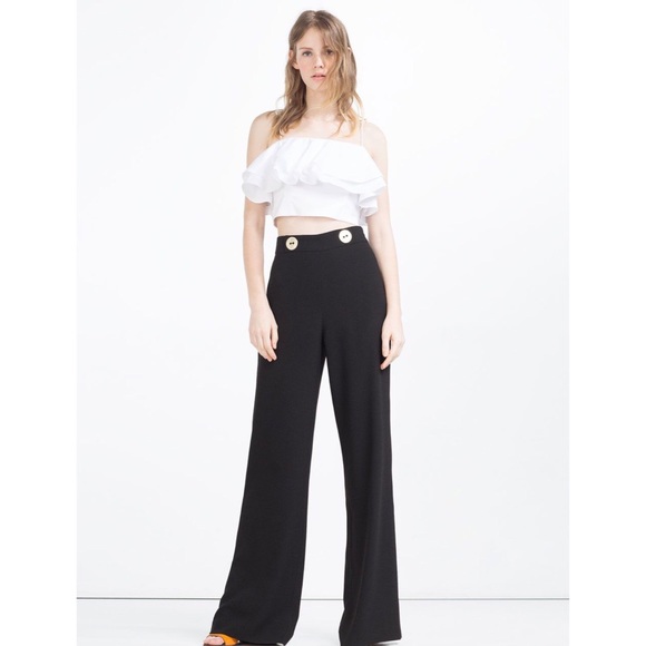 black high waisted trousers with gold buttons